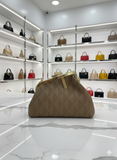 TAN FRAMED CLUTCH BAG WITH QUILTED DIAMOND TEXTURE AND GOLD HARDWARE LADIES SLING BAG