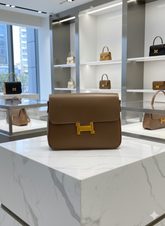 HERMS BLACK LEATHER FLAP BAG WITH GOLD H-SHAPED CLASP LADIES SLING BAG