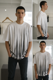 BLCAGA White Round Neck Oversized T-Shirt with Dripping Black Graffiti / Logo Graphic Print