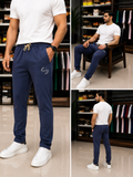 A-X EMBROIDERED CIRCULAR LOGO SLIM-FIT TRACK PANTS