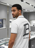 BLMN PARIS LOGO PIQUE BACK PRINT POLO T-SHIRT