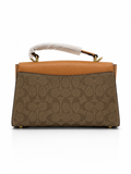 CO ACH GEORGIE SATCHEL IN SIGNATURE CANVAS WITH TAN LEATHER LADIES SLING BAG