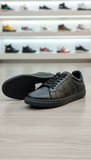 AX Classic Edge: All-Black Faux Leather Low-Top Sneakers