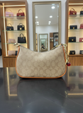 COAH LADIES SLING BAG