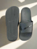 NKE FULL BLACK SLIDES