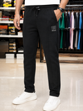 A-X LEATHERETTE PATCH SLIM-FIT TRACK PANTS