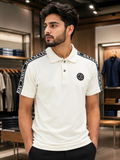 BLMN PARIS LOGO TAPE EMBOSSED BUTTON PIQUÉ POLO T-SHIRT