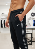 NKE BLACK  WITH WHITE SWOOSH AND LOGO TAPE NS LYCRA DRIFIT TRACK PANTS