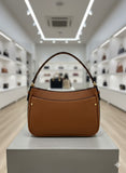 MK SLING BAG
