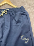 A-X EMBROIDERED CIRCULAR LOGO SLIM-FIT TRACK PANTS